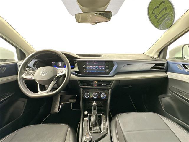 used 2023 Volkswagen Taos car, priced at $25,000