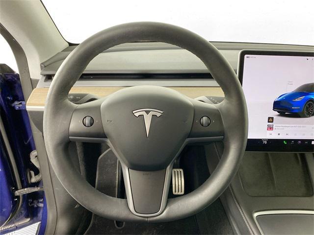 used 2023 Tesla Model Y car, priced at $28,500
