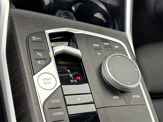 used 2024 BMW 330e car, priced at $33,000