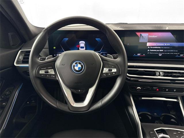 used 2024 BMW 330e car, priced at $33,000