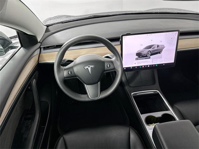 used 2023 Tesla Model 3 car, priced at $30,000