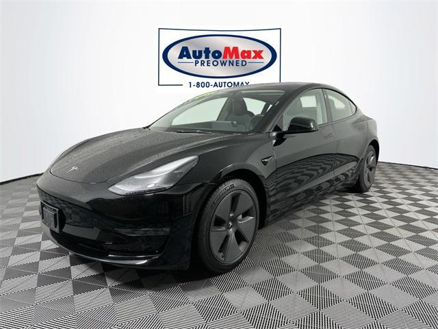 used 2023 Tesla Model 3 car, priced at $30,000