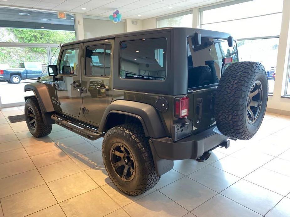 used 2015 Jeep Wrangler Unlimited car, priced at $22,964