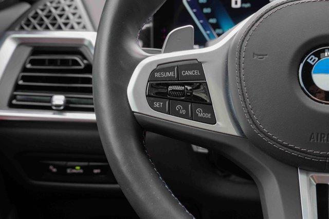 used 2025 BMW X6 car, priced at $84,897