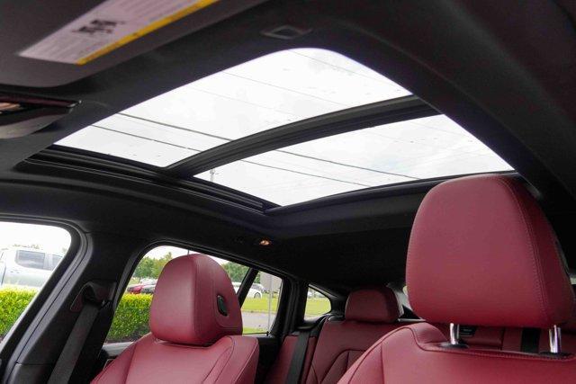used 2025 BMW X4 car, priced at $63,991