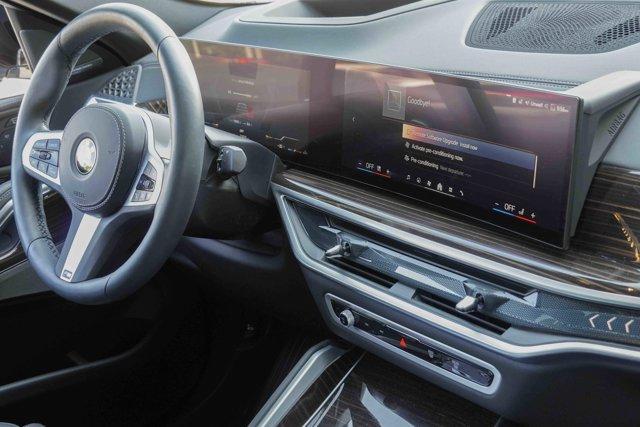 used 2025 BMW X6 car, priced at $73,991