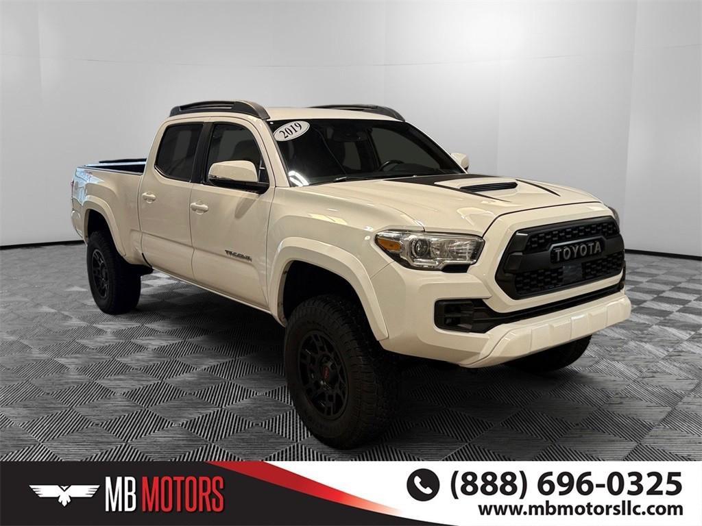 used 2019 Toyota Tacoma car, priced at $29,400