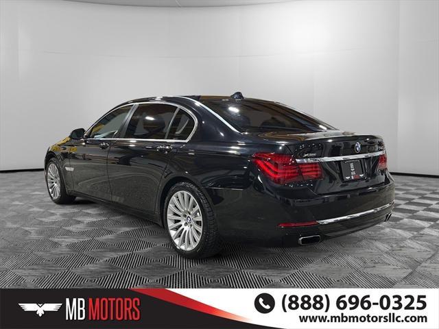 used 2015 BMW 750 car, priced at $17,500