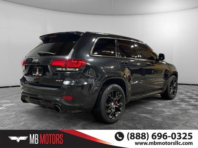 used 2014 Jeep Grand Cherokee car, priced at $27,500