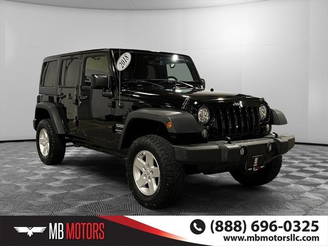 used 2018 Jeep Wrangler JK Unlimited car, priced at $23,850