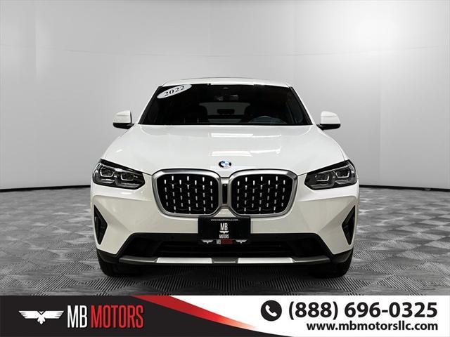 used 2022 BMW X4 car, priced at $38,995
