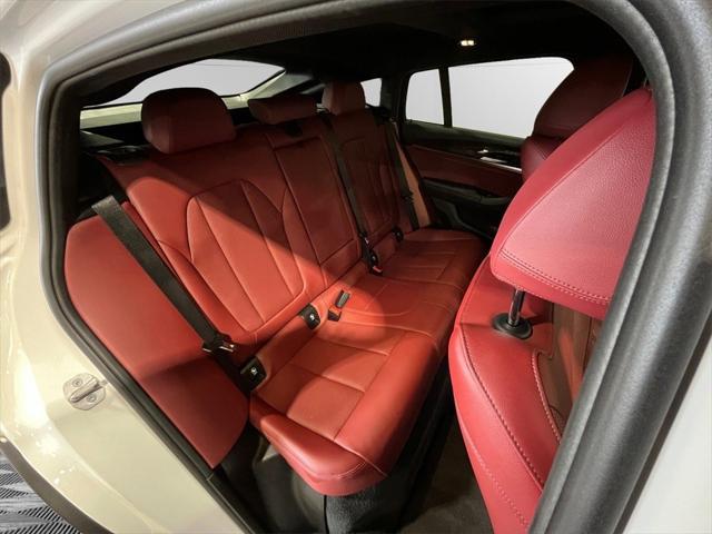 used 2022 BMW X4 car, priced at $38,995