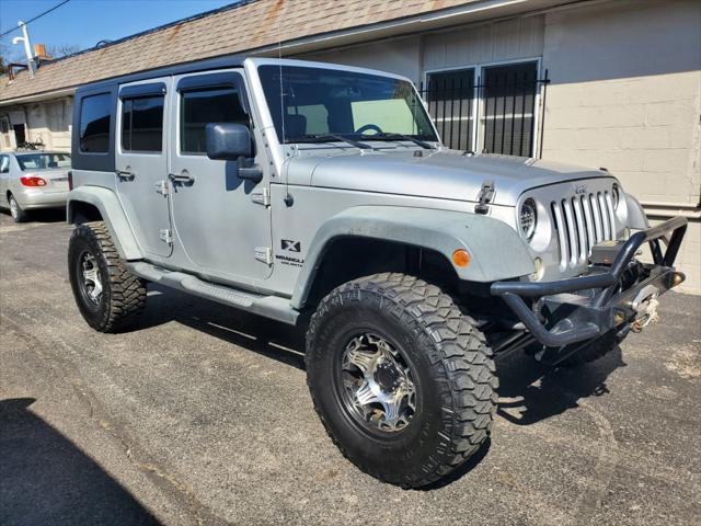 used 2009 Jeep Wrangler Unlimited car, priced at $10,900