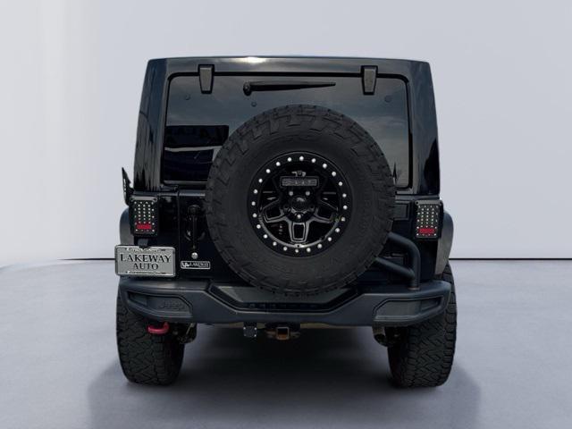 used 2015 Jeep Wrangler Unlimited car, priced at $21,621