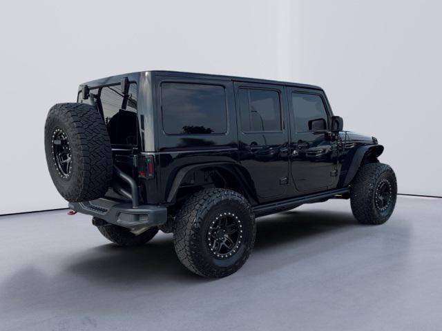 used 2015 Jeep Wrangler Unlimited car, priced at $21,621