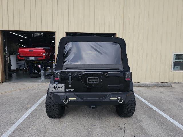 used 2014 Jeep Wrangler Unlimited car, priced at $17,900