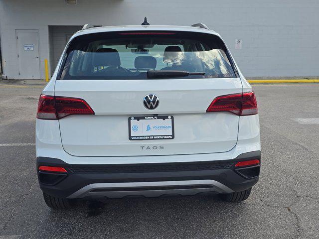 new 2024 Volkswagen Taos car, priced at $26,121