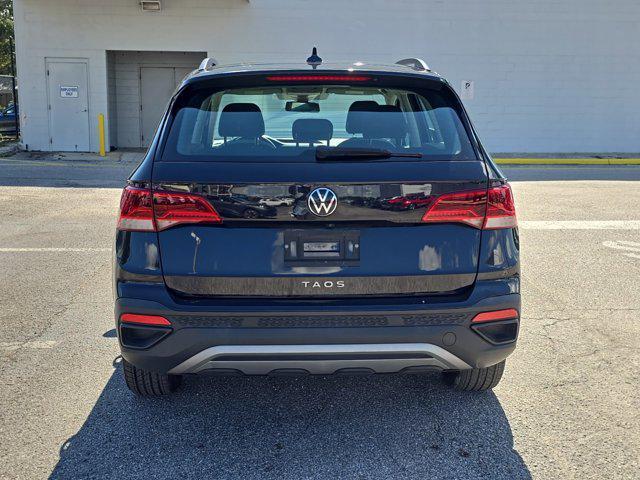 used 2022 Volkswagen Taos car, priced at $19,291