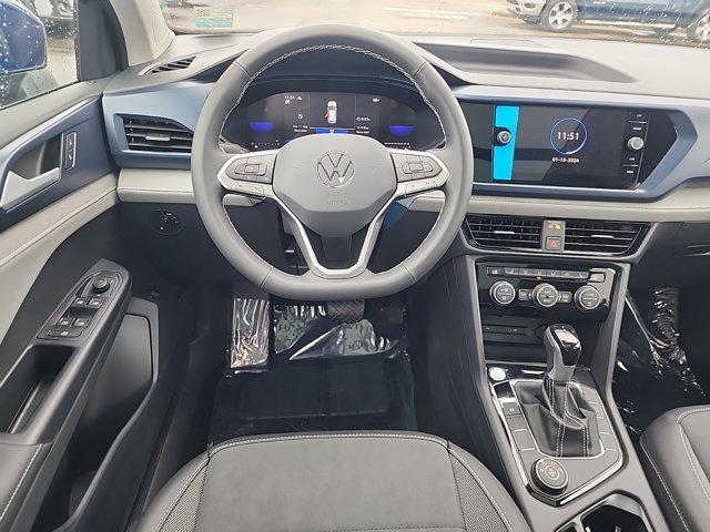 new 2024 Volkswagen Taos car, priced at $33,098