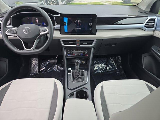 new 2025 Volkswagen Taos car, priced at $31,221
