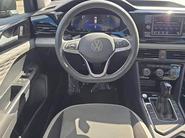 used 2023 Volkswagen Taos car, priced at $21,046