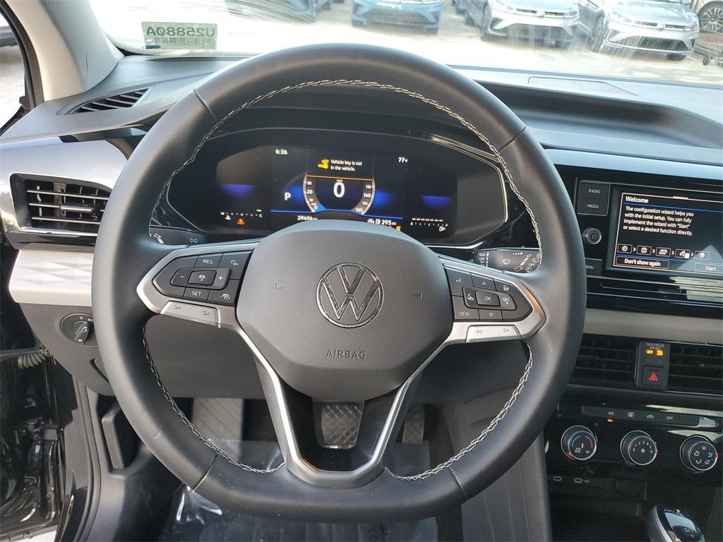 used 2023 Volkswagen Taos car, priced at $19,377