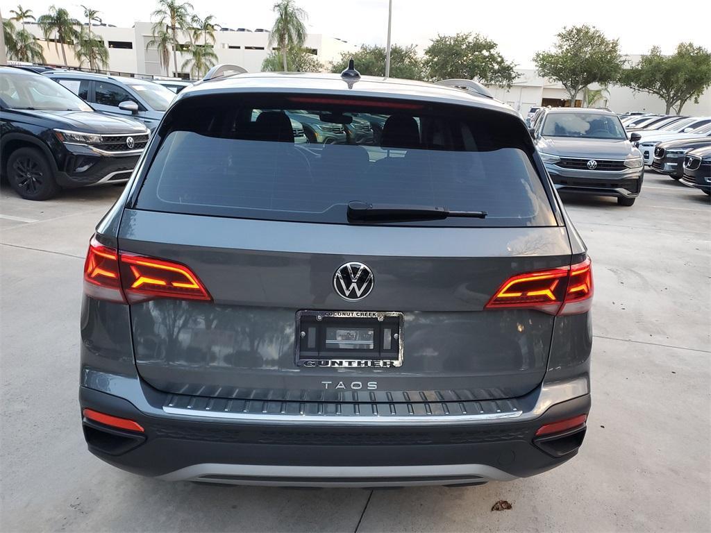 used 2023 Volkswagen Taos car, priced at $22,677