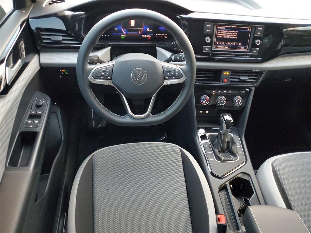 used 2023 Volkswagen Taos car, priced at $22,677