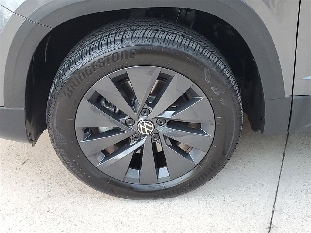 used 2023 Volkswagen Taos car, priced at $22,677