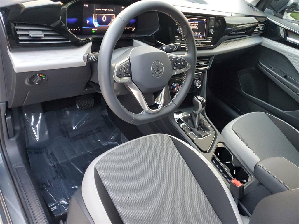 used 2023 Volkswagen Taos car, priced at $22,677