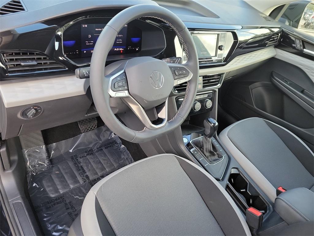 used 2023 Volkswagen Taos car, priced at $18,977