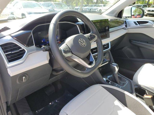 new 2025 Volkswagen Taos car, priced at $29,011