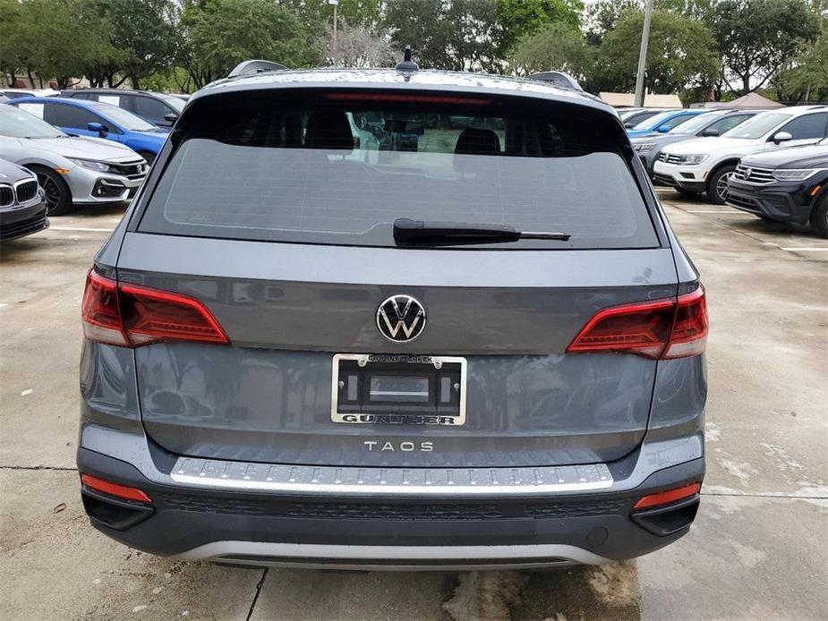 used 2022 Volkswagen Taos car, priced at $18,677