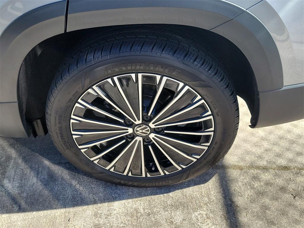 used 2025 Volkswagen Taos car, priced at $28,598