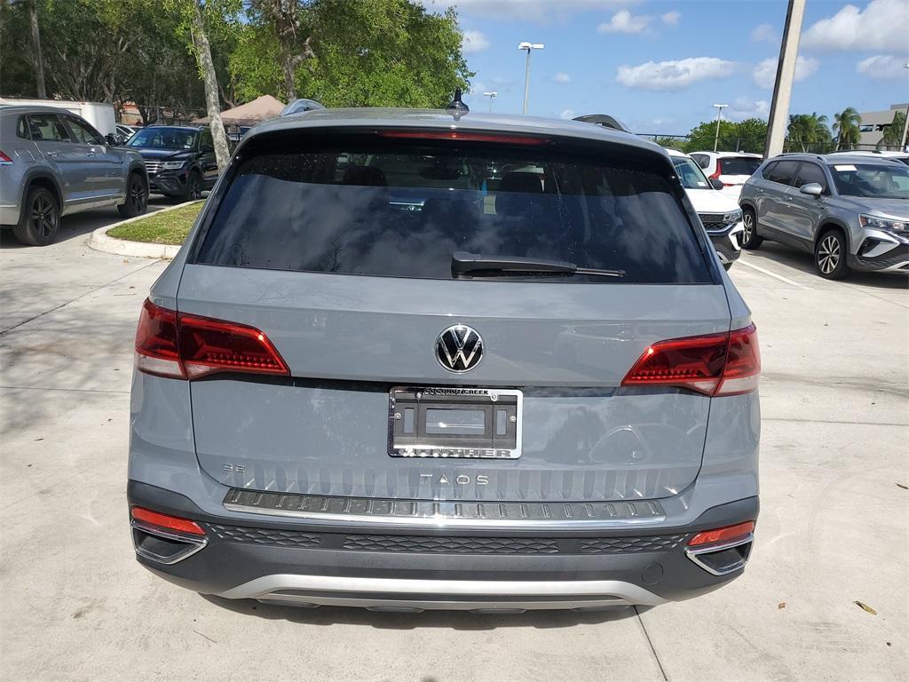 used 2023 Volkswagen Taos car, priced at $23,577