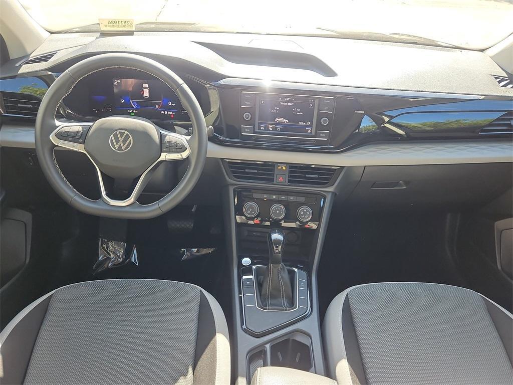 used 2023 Volkswagen Taos car, priced at $18,998