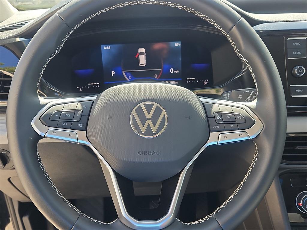 used 2023 Volkswagen Taos car, priced at $18,998