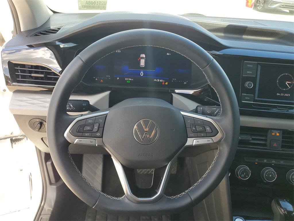 used 2023 Volkswagen Taos car, priced at $19,577