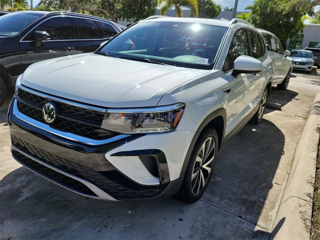 used 2024 Volkswagen Taos car, priced at $21,977