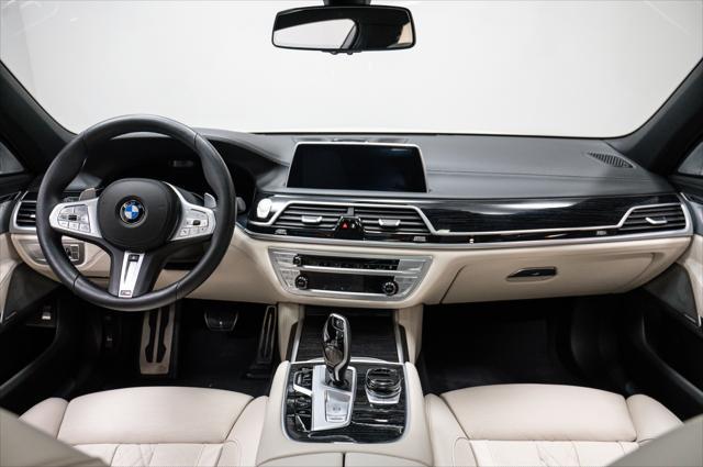 used 2022 BMW 750 car, priced at $63,995