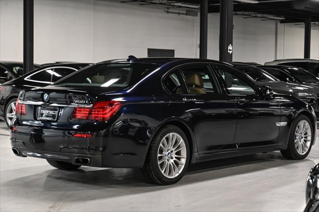 used 2015 BMW 750 car, priced at $17,495