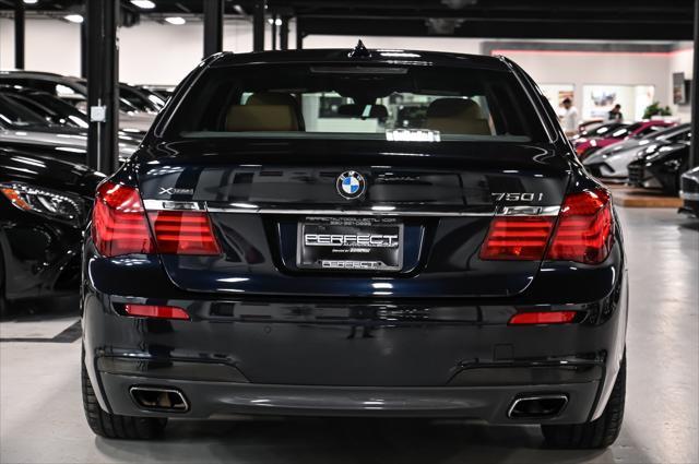 used 2015 BMW 750 car, priced at $17,495