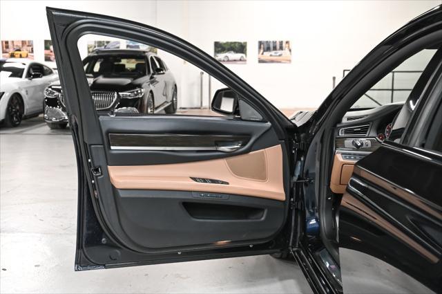 used 2015 BMW 750 car, priced at $17,495