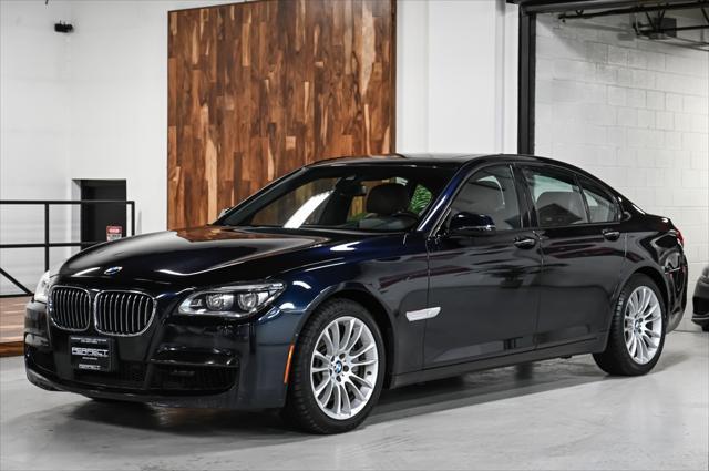 used 2015 BMW 750 car, priced at $17,495