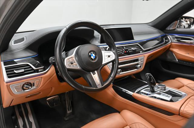 used 2022 BMW 750 car, priced at $56,495