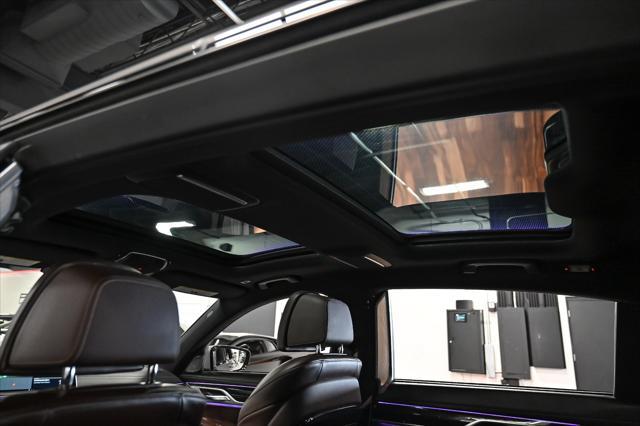 used 2022 BMW 750 car, priced at $57,877