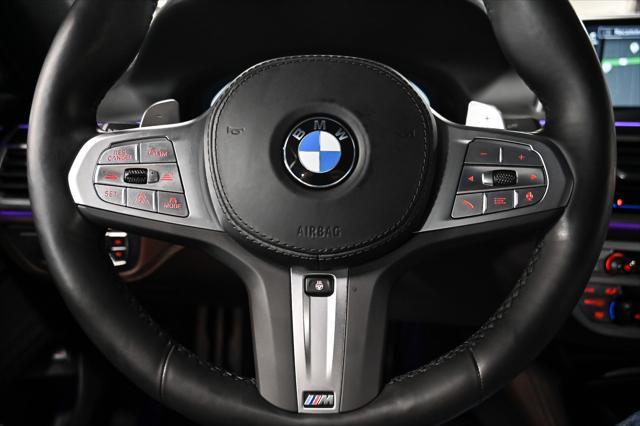 used 2022 BMW 750 car, priced at $57,877