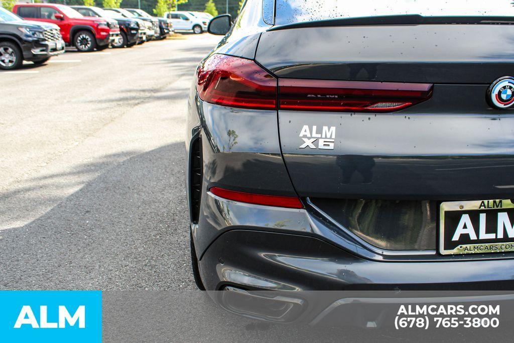 used 2023 BMW X6 car, priced at $62,920