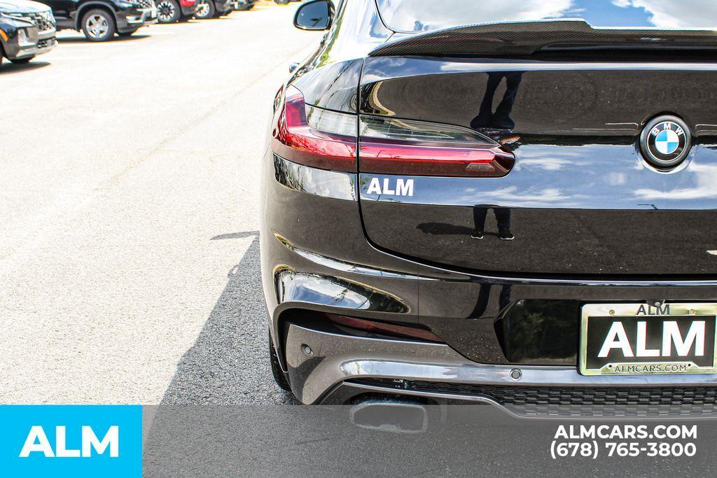used 2021 BMW X4 car, priced at $38,970