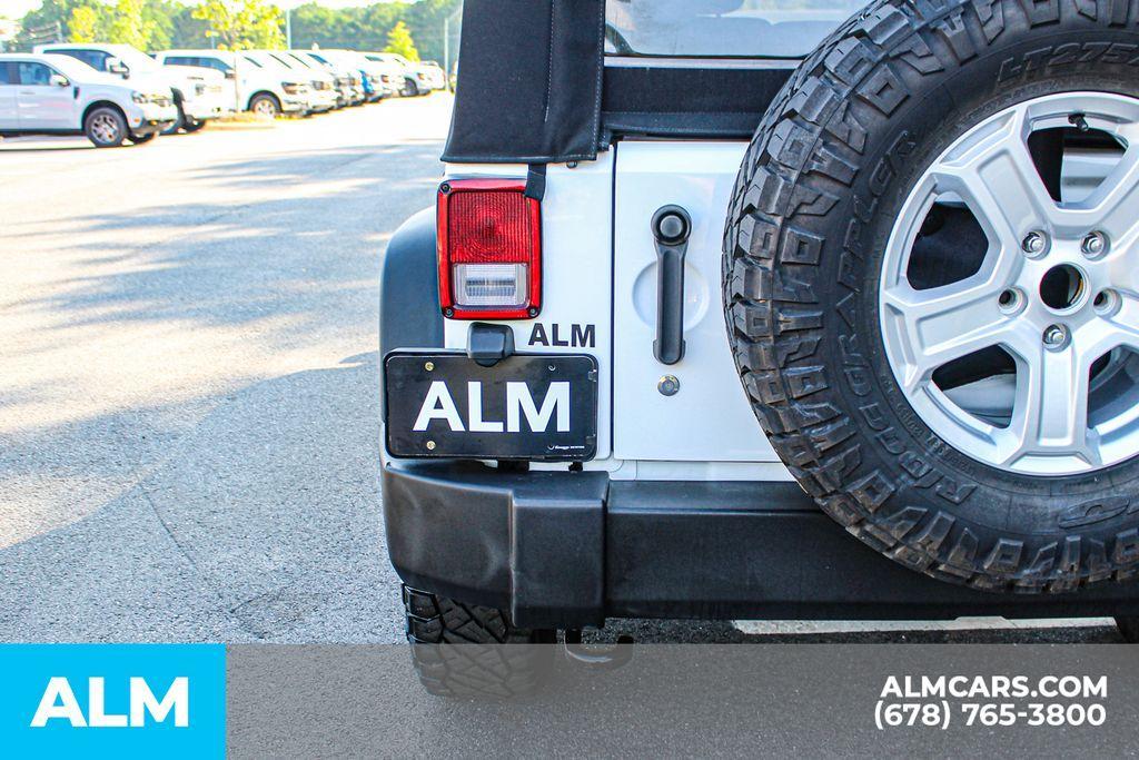 used 2016 Jeep Wrangler Unlimited car, priced at $18,420